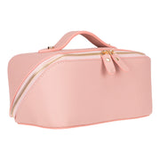 Dusty pink full grain leather makeup bag in three-quarter view