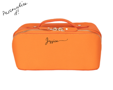 Orange leather makeup bag with script engraving example