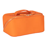 Melon full grain leather makeup bag in three-quarter view