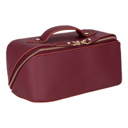 Garnet full grain leather makeup bag in three-quarter view
