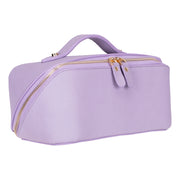 Magenta full grain leather makeup bag in three-quarter view